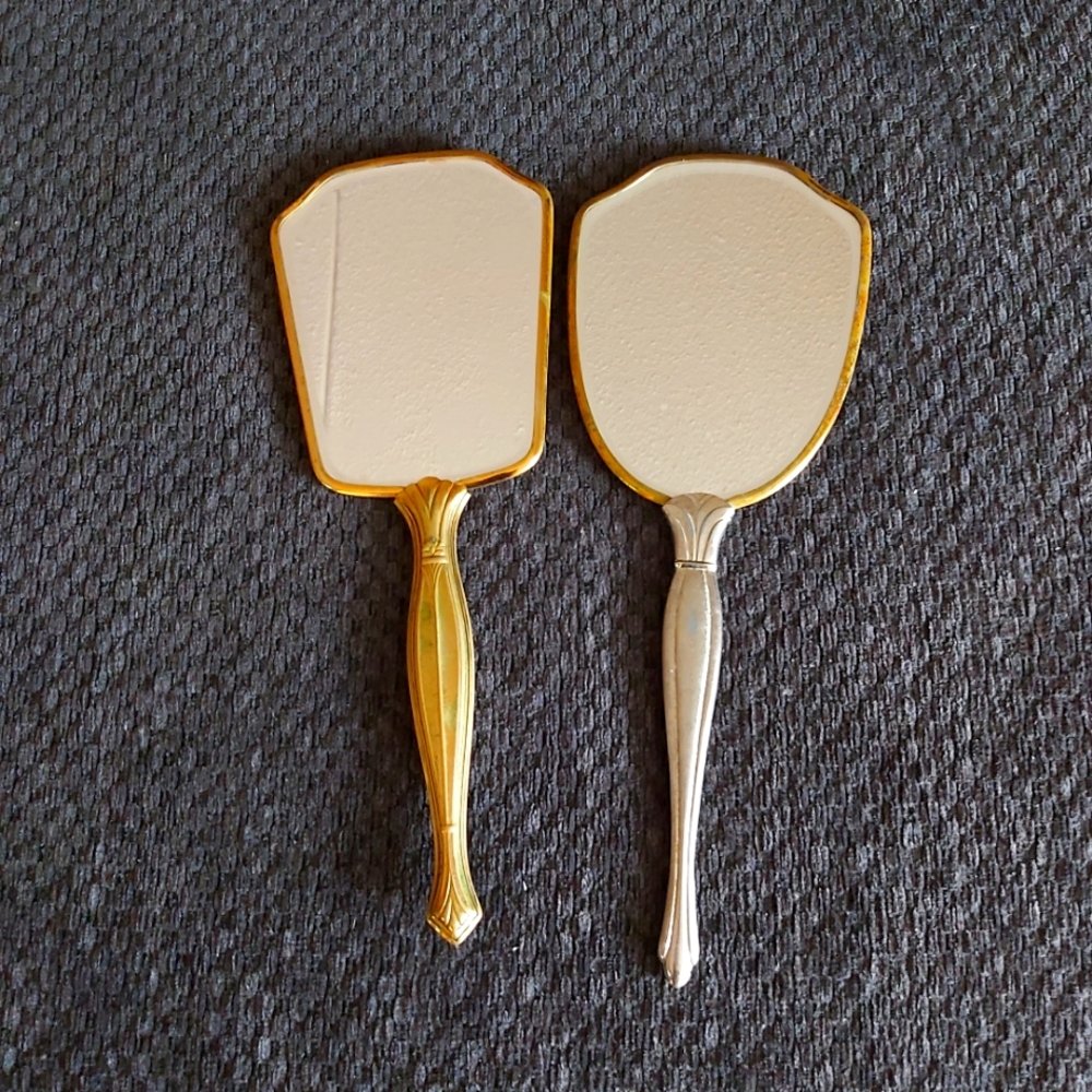 Hand held mirrors